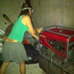 Leanne working the backup generator at Casa De Las Olas sustainable beach villas in Tulum mexico