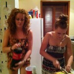 Sara pouring me a Rum and Coke and Malin making food monthinplaya